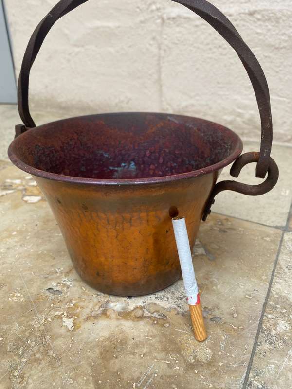 vintage hammered copper cauldron planter with wrought iron handle