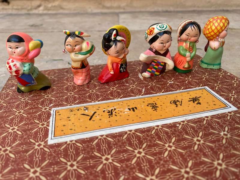Vintage Chinese figurine lot of 12 in national outfits , clay and hand painted in box
