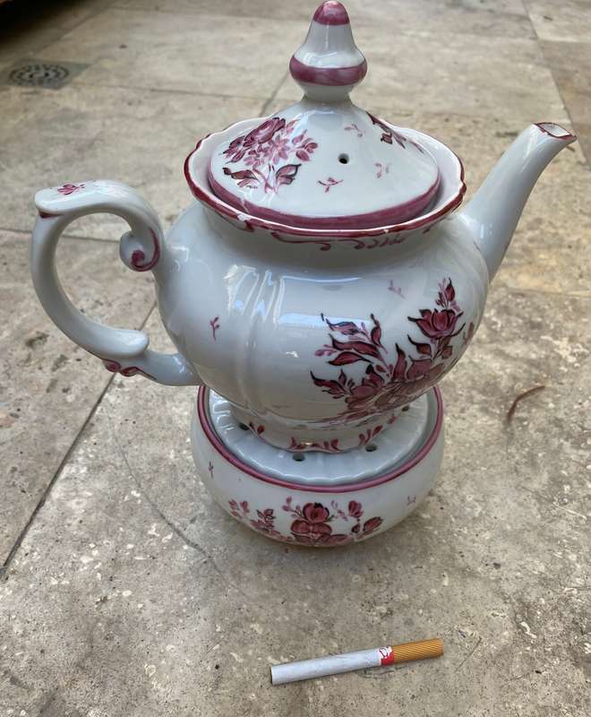 Vintage porcelain floral teapot with warmer stövchen