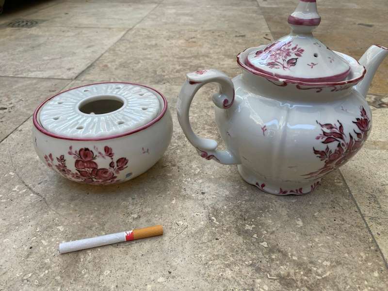 Vintage porcelain floral teapot with warmer stövchen