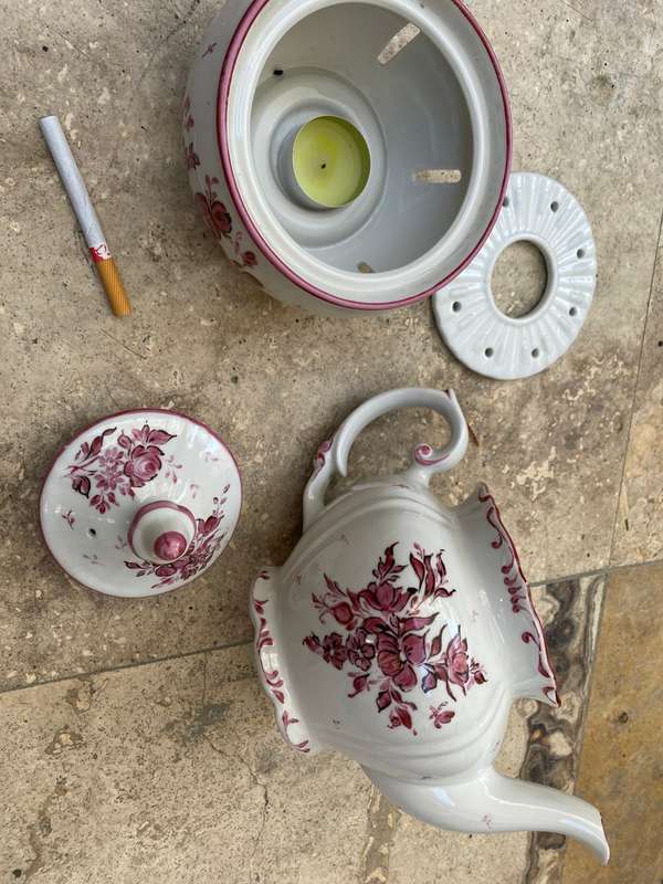 Vintage porcelain floral teapot with warmer stövchen