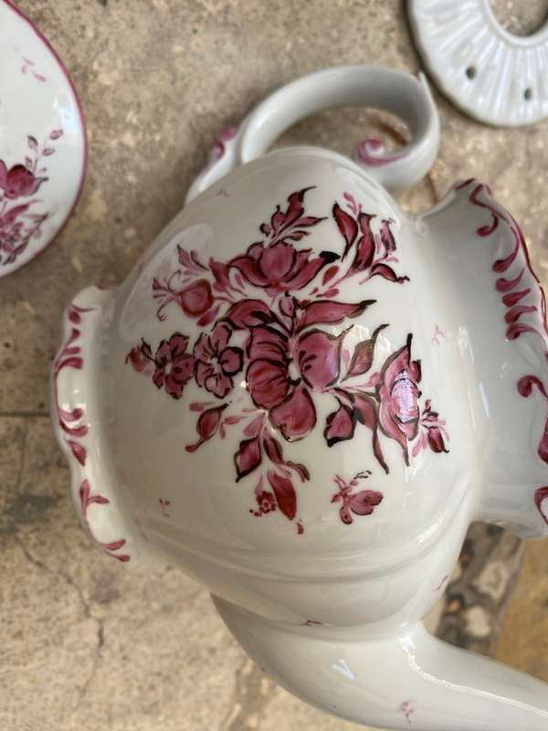 Vintage porcelain floral teapot with warmer stövchen