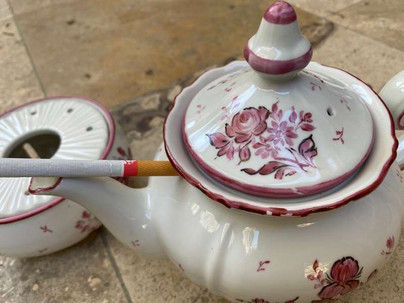 Vintage porcelain floral teapot with warmer stövchen