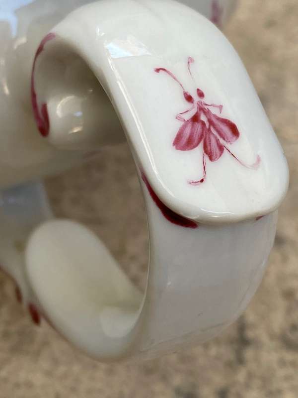 Vintage porcelain floral teapot with warmer stövchen