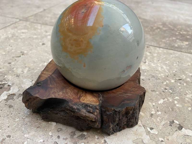 Jasper Polished precious stone sphere 8 cm diameter 24 c, circumference on carved wood base