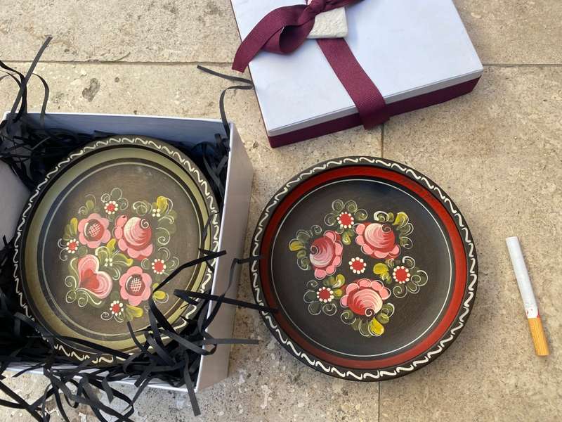 Pair of vintage folk art floral wood decorative wall plates hand painted