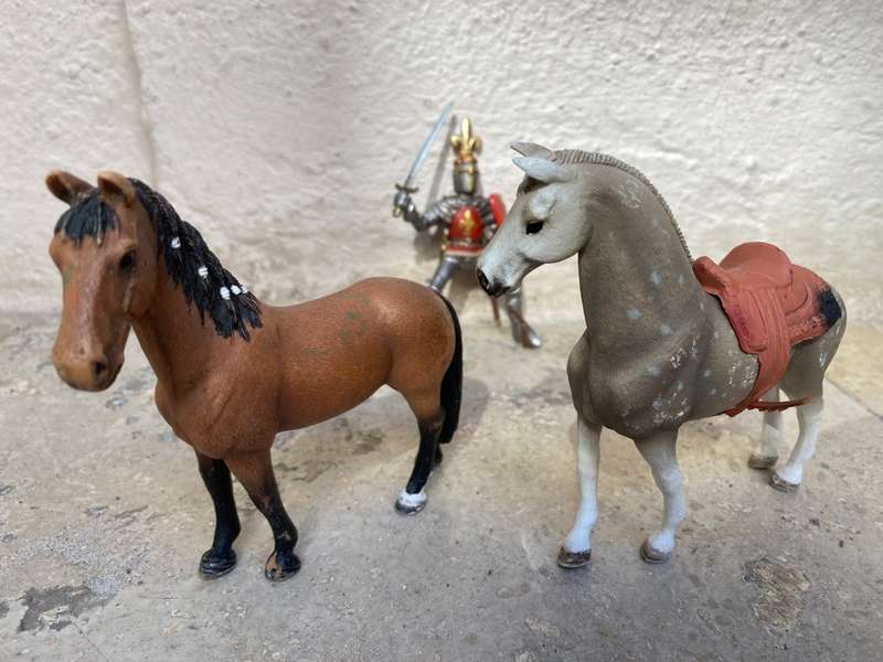 Schleich horse pair with Schleich knight rider figure on black knight medieval horse