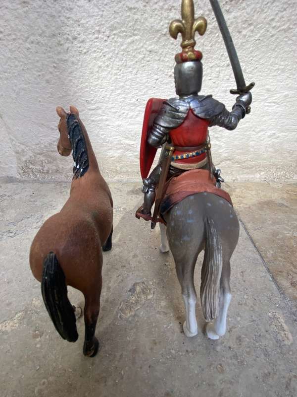 Schleich horse pair with Schleich knight rider figure on black knight medieval horse