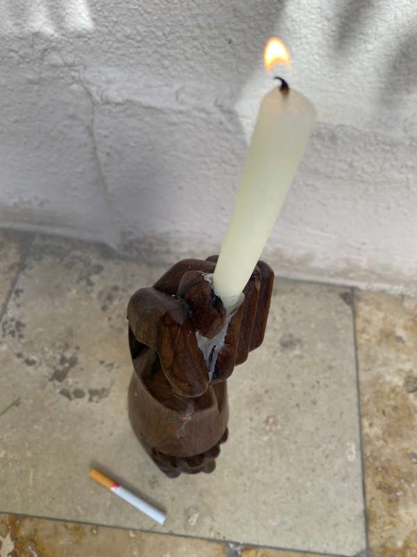 Vintage wood Indian totem hand statue candle holder