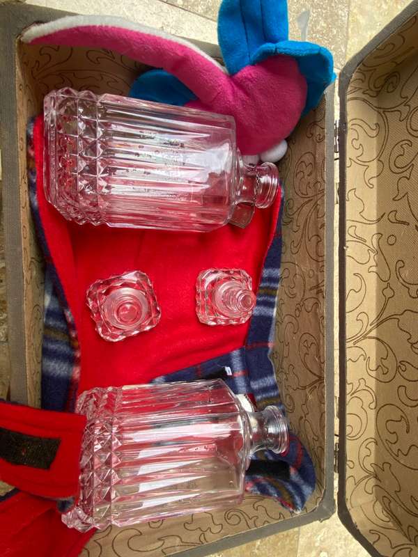 Lead crystal decanter pair with Sterling silver labels vodka and rum