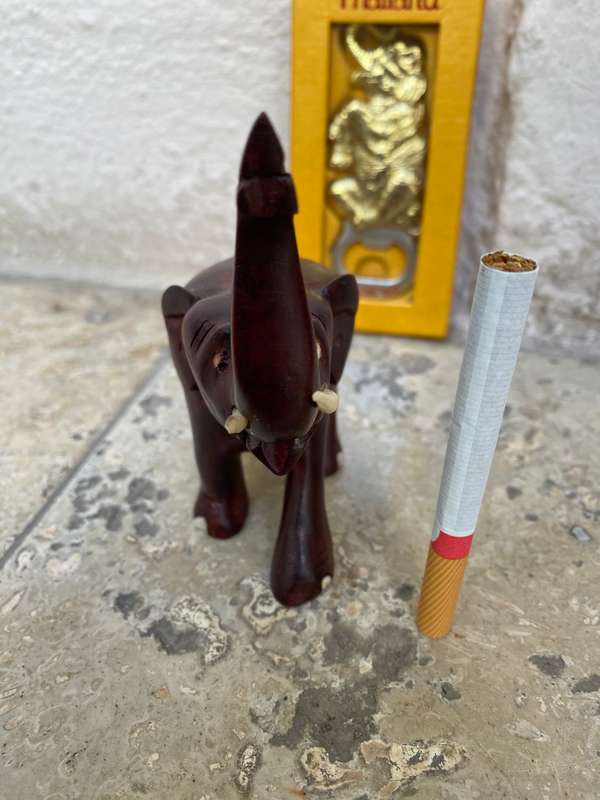 Vintage trunk up elephant wood figure & magnet bottle opener Thailand pair