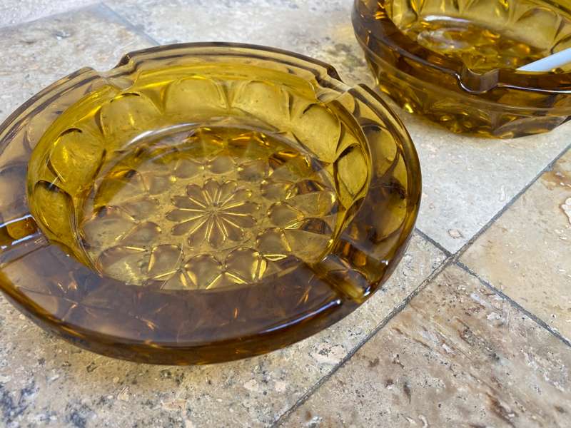 Vintage retro heavy amber glass ashtray pair