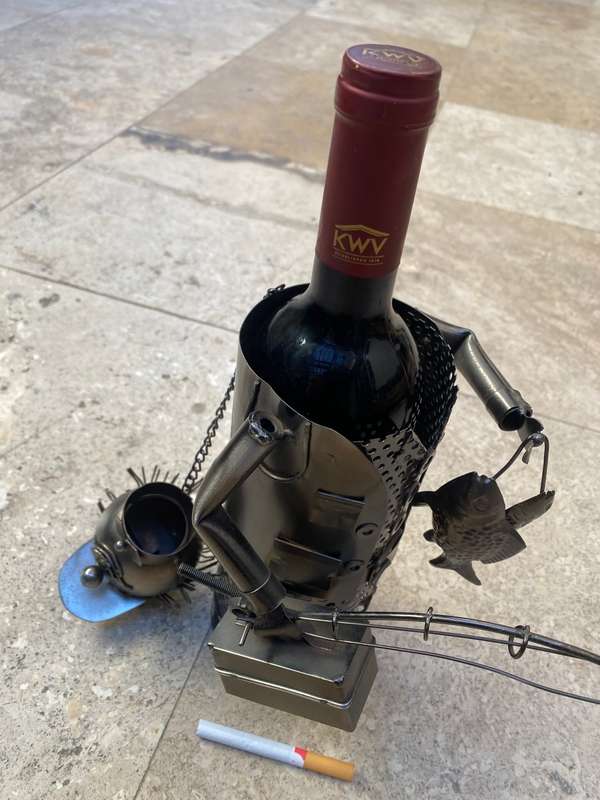 Vintage wine caddy fisherman fishing man metal