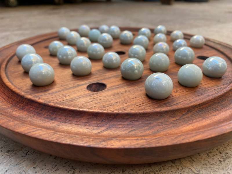 Vintage solitaire marbles marble game