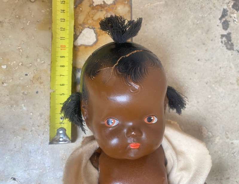 Antique African composition doll plastic