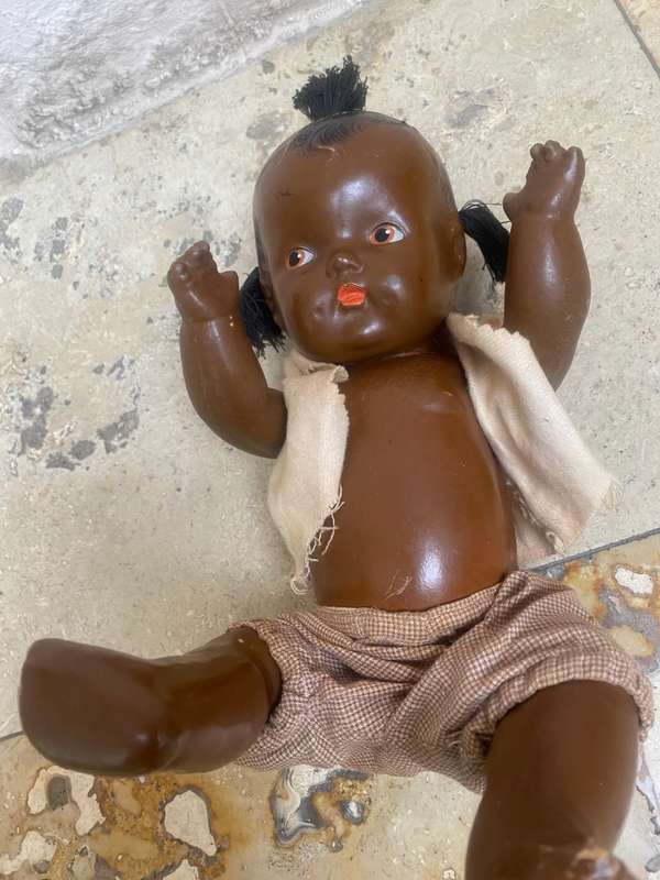 Antique African composition doll plastic