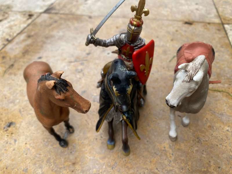 Schleich horse pair with Schleich knight rider figure on black knight medieval horse