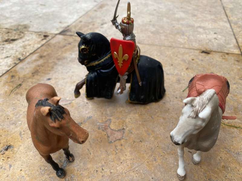 Schleich horse pair with Schleich knight rider figure on black knight medieval horse