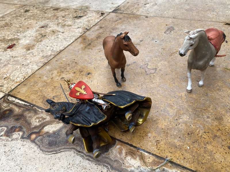 Schleich horse pair with Schleich knight rider figure on black knight medieval horse