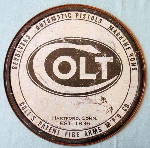 Colt revolvers automatic pistols machine guns metal sign