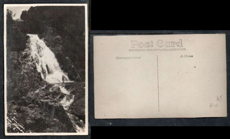 South Africa, waterfalls near Barberton, Transvaal, 2 men in shorts, photo