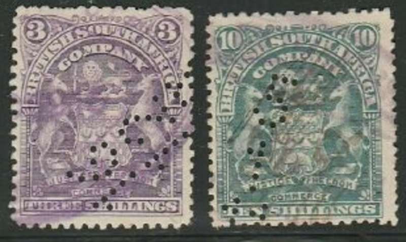 Southern Rhodesia, 1898 - 1908, small arms, 3/, 10/, fiscal used, date perfins