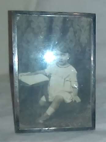 Sterling silver  frame, photo of young child