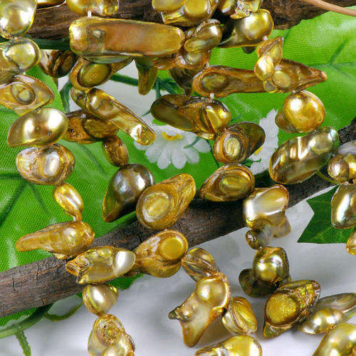 Golden Green Baroque Winged Freshwater Pearls(per strand of +/-55 - 60 Pearls)