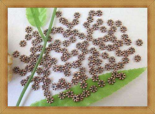 Copper Daisy spacers(4mm)Pack of 10