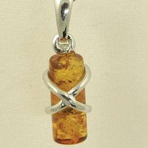 Original KAM jewelry: 925 Sterling Silver and natural Amber pendant: 0.996g
