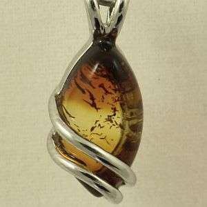 Original KAM jewelry: 925 Sterling Silver and natural Amber pendant: 1.410g
