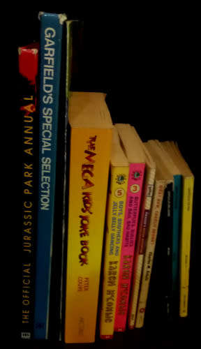 Children`s collection 11 books: Garfield, Jurassic Park, Pokemon, Charlie Brown, Dragonball Z, etc.
