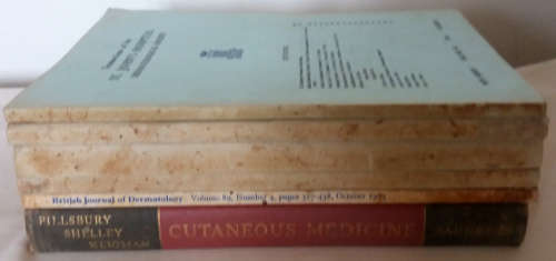 Cutaneous medicine book and 5 journals on Dermatology