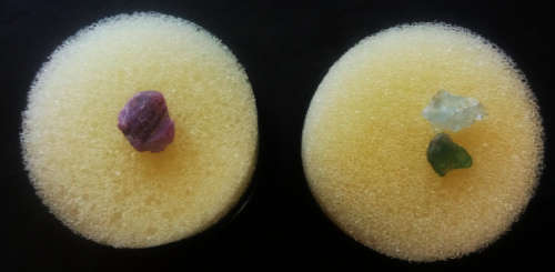 9 tiny and small mixed lot of semi-precious gemstones in 8 round display boxes