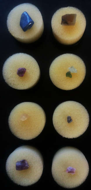 9 tiny and small mixed lot of semi-precious gemstones in 8 round display boxes