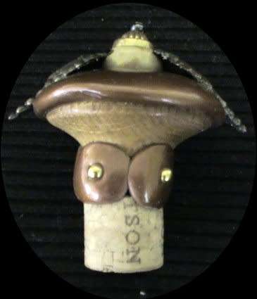 2 Bottle cap openers, 1 cork remover and 1 cork stopper