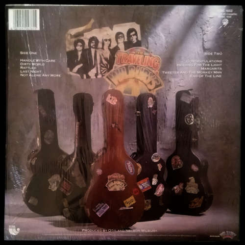 The Travelling Wilburys volume One vinyl lp released 1988 (VG/Ex VG+)