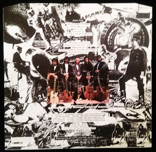 The Travelling Wilburys volume One vinyl lp released 1988 (VG/Ex VG+)