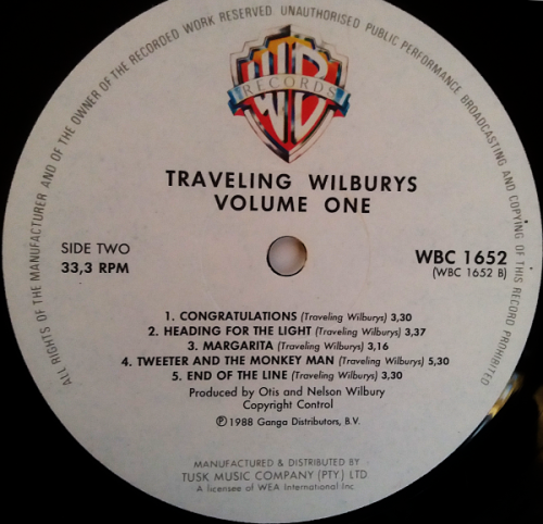 The Travelling Wilburys volume One vinyl lp released 1988 (VG/Ex VG+)