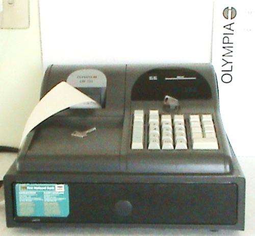 OLYMPIA CASH REGISTER model CM720 (4 dept)  with manual and register paper rolls X11