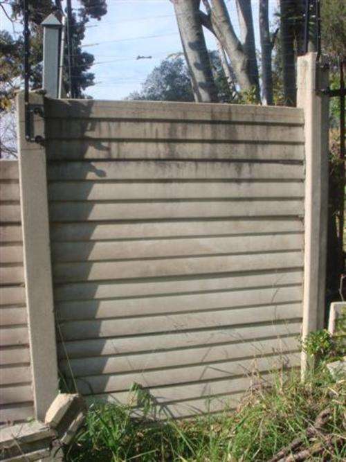 Concrete walling approx 30m with concrete vertical columns and concrete vertical slats