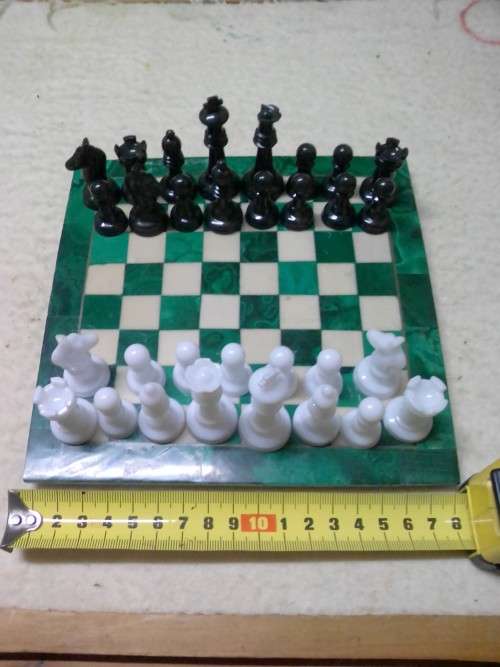 A VINTAGE MARBLE CHESS BOARD