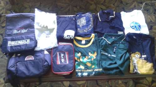 COLLECTABLE T-SHIRTS AND COOLER BAGS @ 7 x  T-SHIRTS, 4 x COOLER BAGS and 1x SCARF