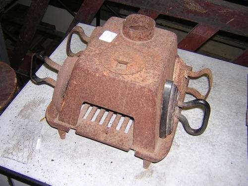 stove ,old cast iron stove used ironing....