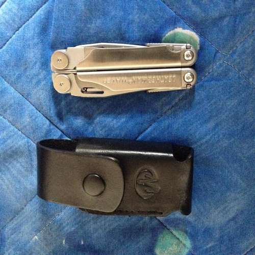 Brand New Leatherman Wave with Leather Leatherman Pouch