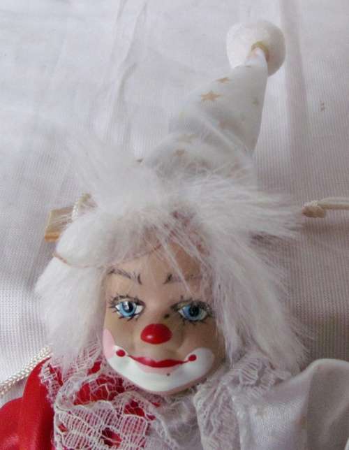 Vintage - Porcelain Clown on a Swing - 28cm from top to bottom