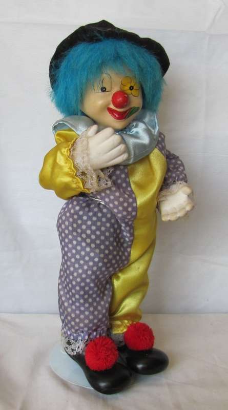Vintage - Windup Musical Porcelain Clown with bendable Arms - 34cm