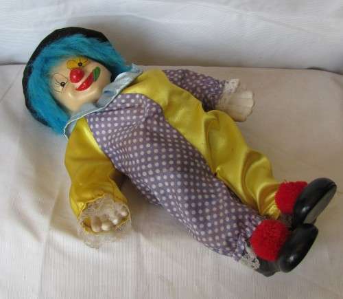 Vintage - Windup Musical Porcelain Clown with bendable Arms - 34cm