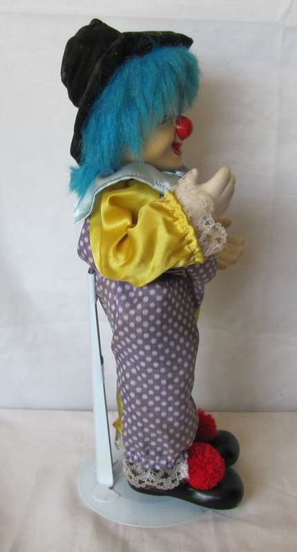 Vintage - Windup Musical Porcelain Clown with bendable Arms - 34cm
