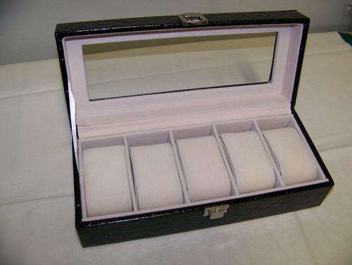 Black leatherette watch case. Holds 5 watches.